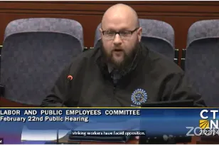 Local 405 President Ben Wilcox testifies