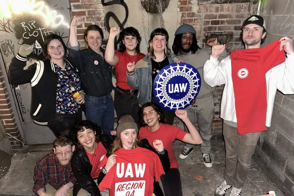 Nitehawk union members with UAW signs