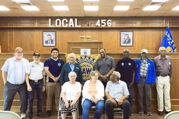 Region 9A Director Brandon Mancilla with retirees
