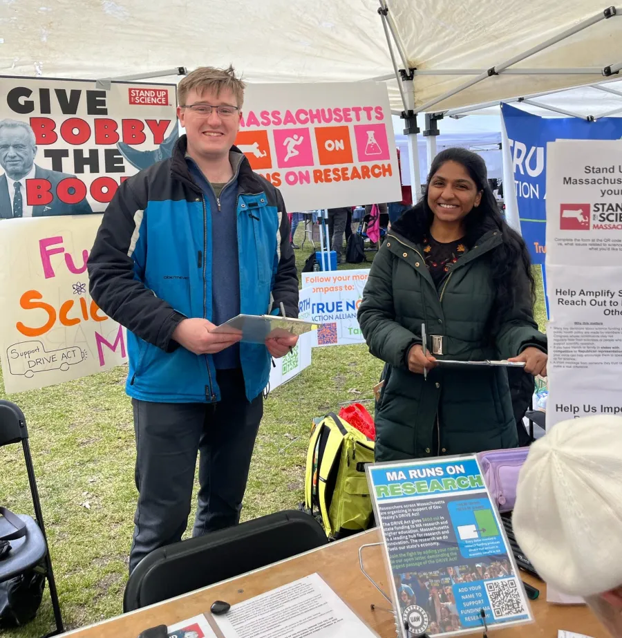 UAW members tabling for research funding at the No Kings rally in Boston in March 2026