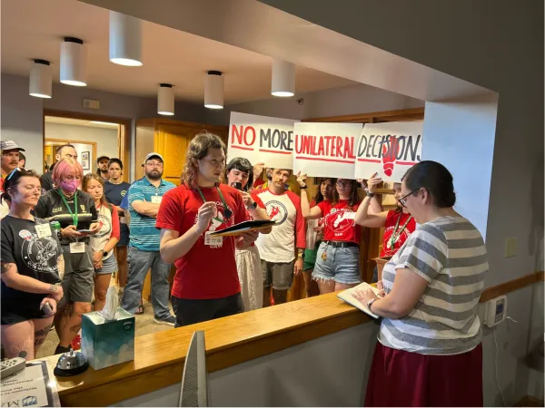 Members of the University of Maine Graduate Student Union taking action
