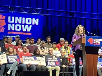 CFU-UAW member Elisabeth Fay speaks at Union Now Rally in April 2026